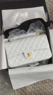CHANEL 25S FLAP BAG 25.5 CM IN WHITE LAMBSKIN