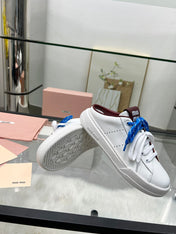 SNEAKER MULES IN WHITE CALFSKIN WHITE BLUE LACES